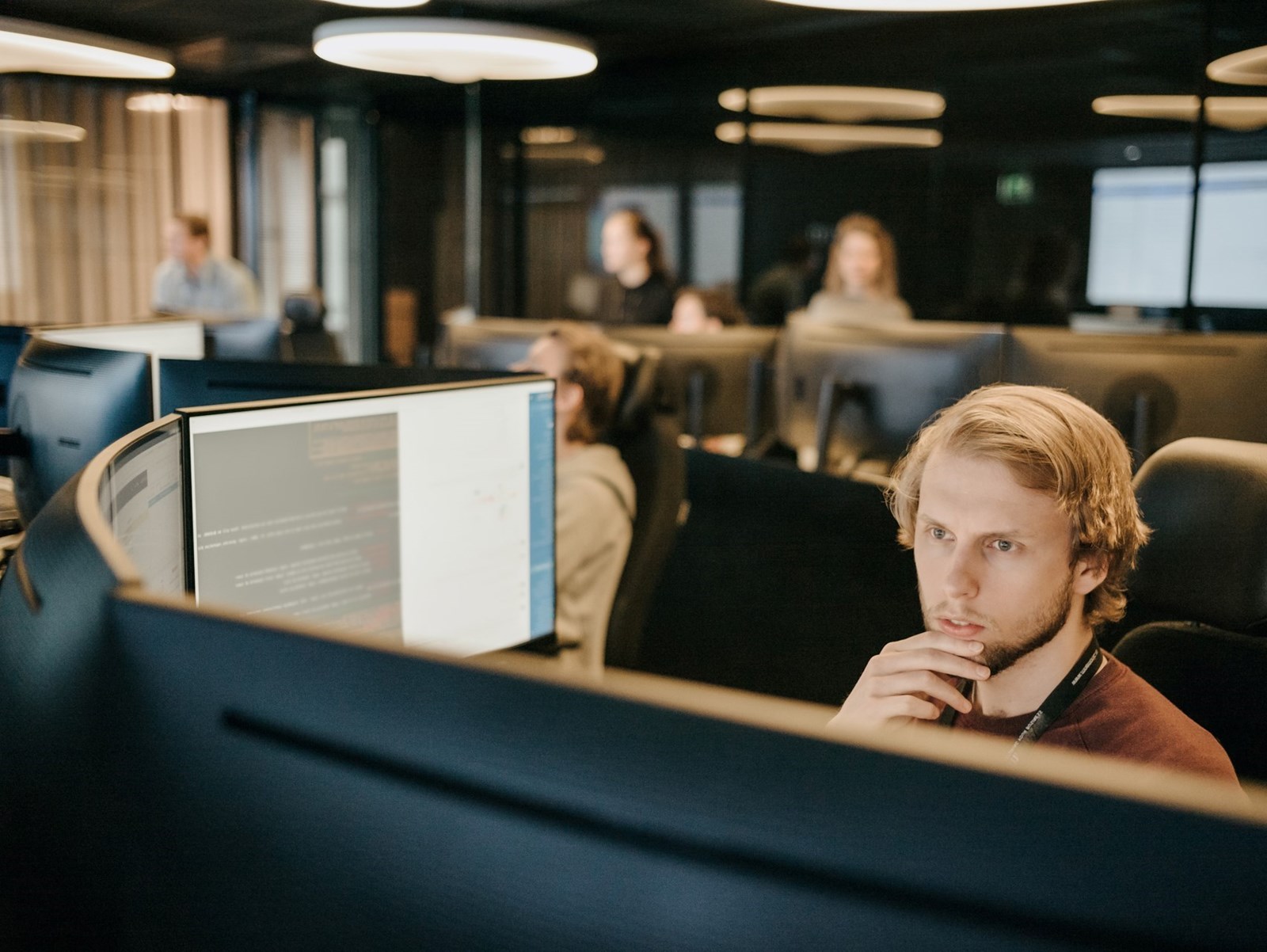 Person looking at computer screens